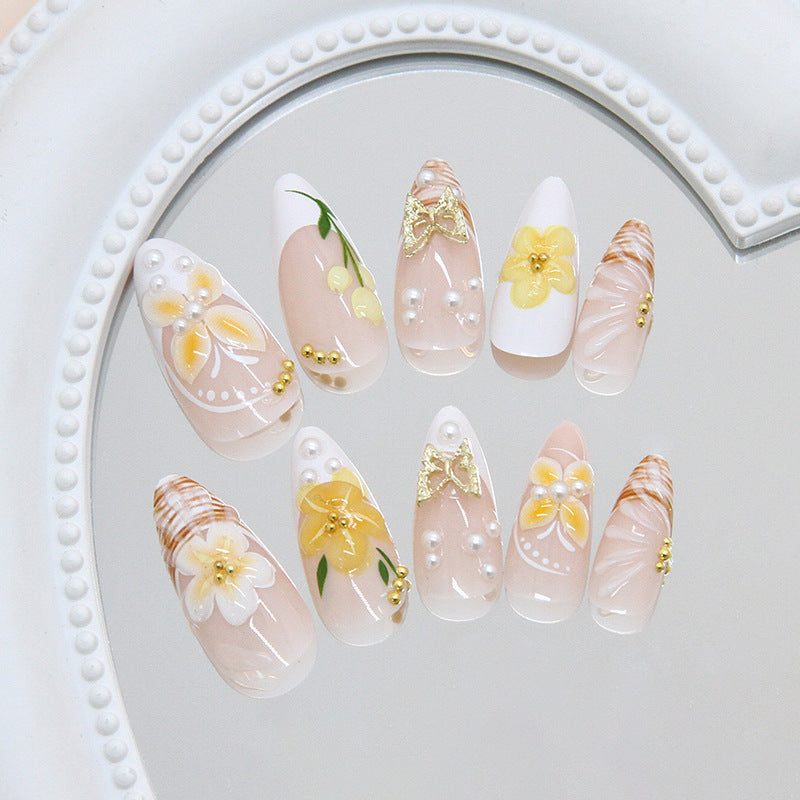 Medium French Tip & Pearl Detail Press-On Nail Set (24 Pieces) on hand