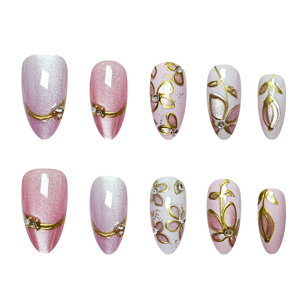 Gold-Plated & Cat Eye Press-On Nails on hand