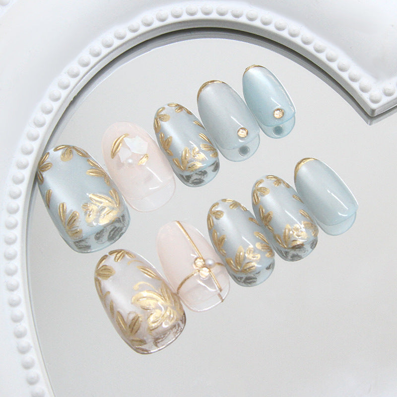 Cat Eye & Gold-Plated Cat Eye Nails, Short Oval, 24 Pieces – side angle