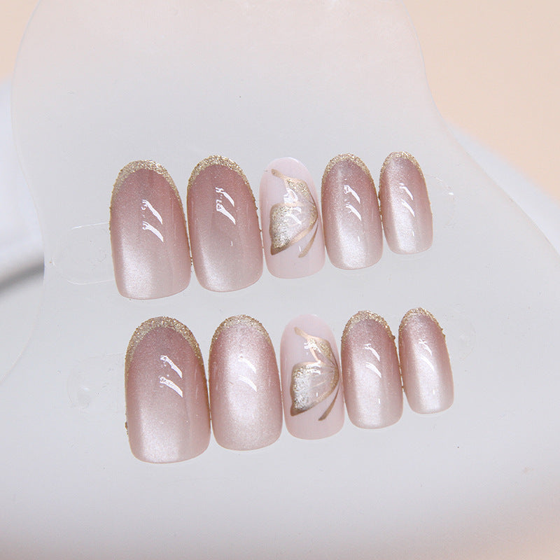 Oval Cat Eye & Butterfly Press-On Nail Set (24 Pieces) on hand