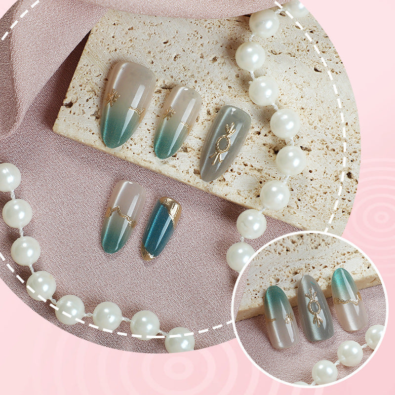 Emerald Green & Gemstone Cat Eye Press-On Nails, Medium – close-up detail