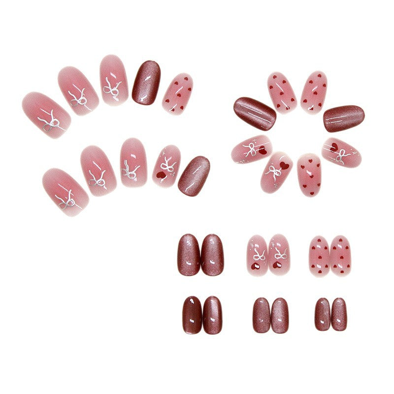 Polka Dot & Cat Eye Press-On Nails, Medium Oval on hand
