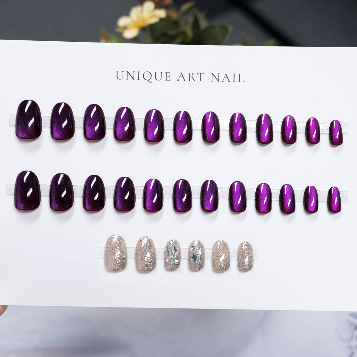 Short Almond Duo-Tone Shimmer & Cat Eye Press-On Nail Set (24 Pieces) on hand