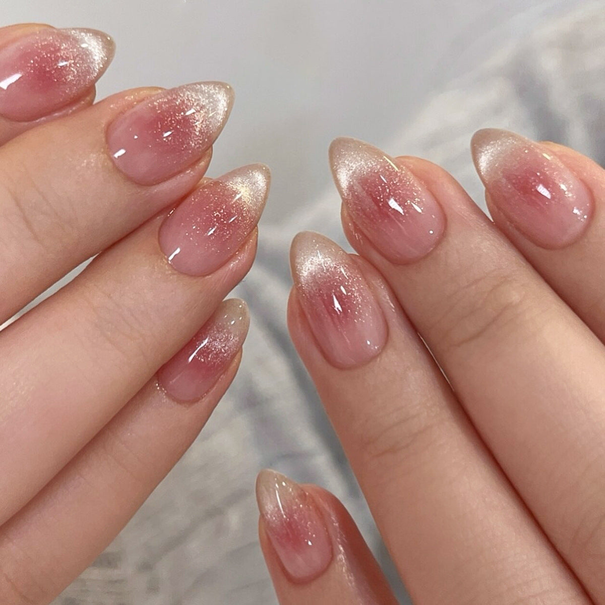 Pink Cat Eye Press-On Nails, Short Almond, Ice-Clear Finish – front view