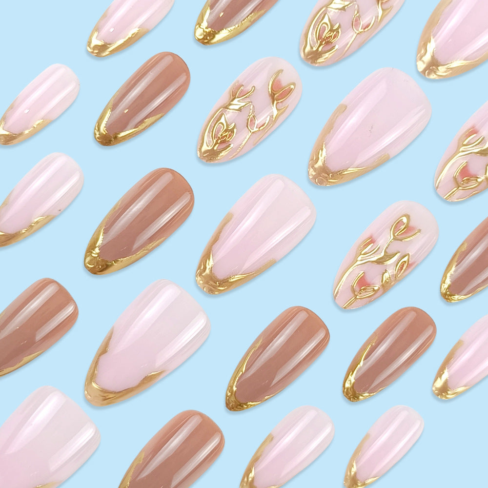 Gold-Plated & Embossed Texture French Press-On Nails on hand