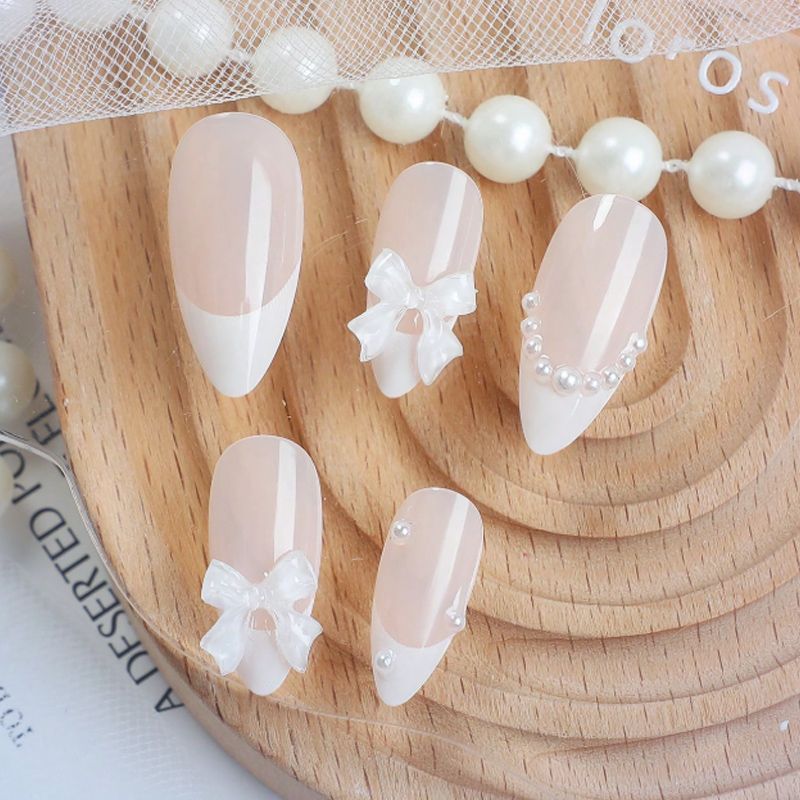 French Tip & Bowknot Press-On Nails, Almond, 24-Piece Set – side angle