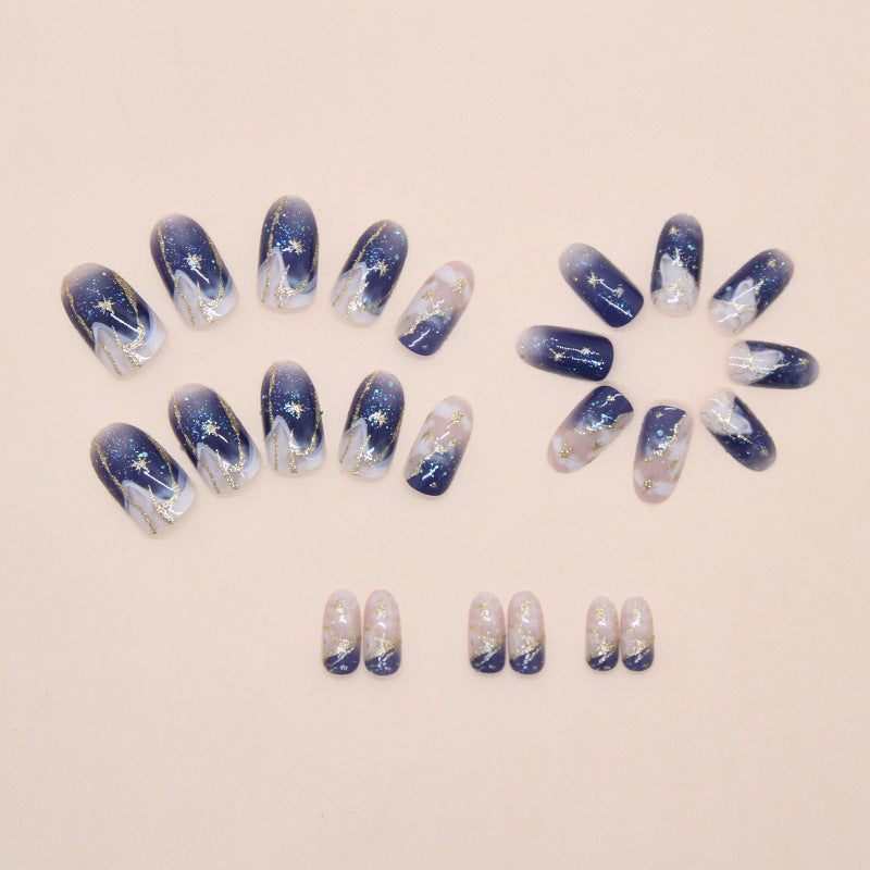 Blue Ombre Quicksand Press-On Nails, Short Oval on hand