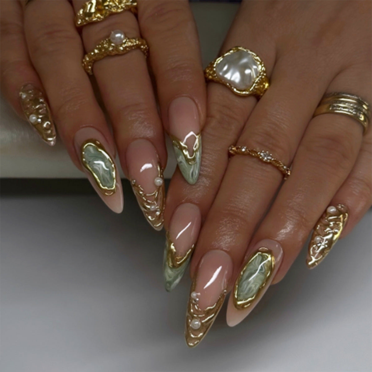 Gilt French Tip Press-On Nails with Aurora Quicksand & Pearls, Almond – front view