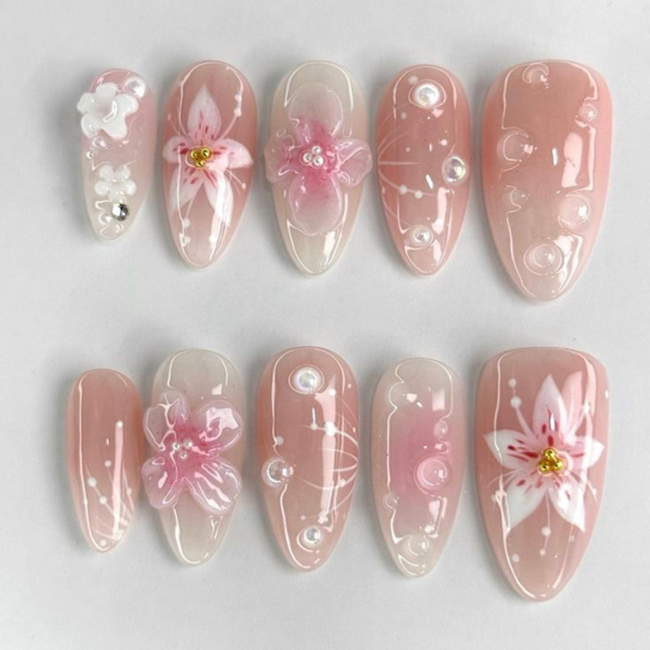 Short Almond French Tip & Floral Press-On Nail Set (24 Pieces) on hand