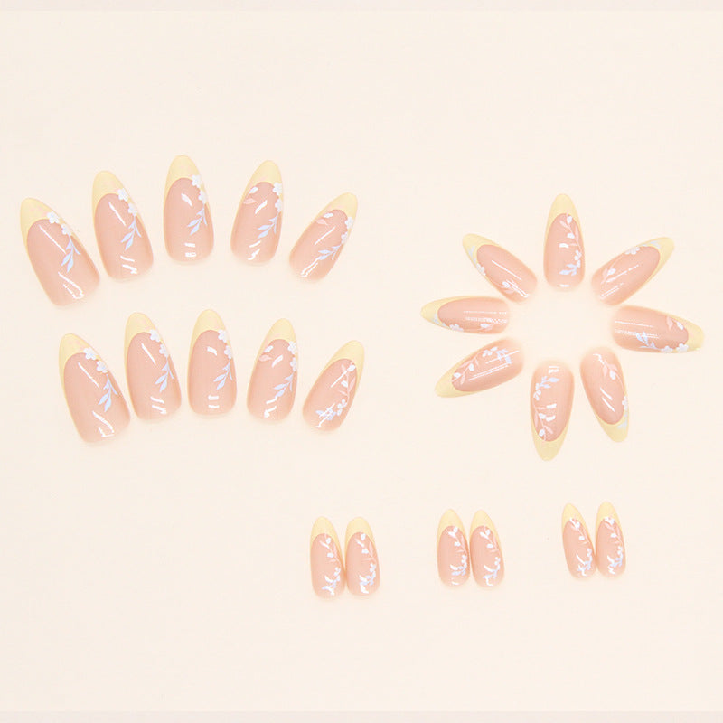 Almond French Tip Press-On Nail Set (24 Pieces) on hand