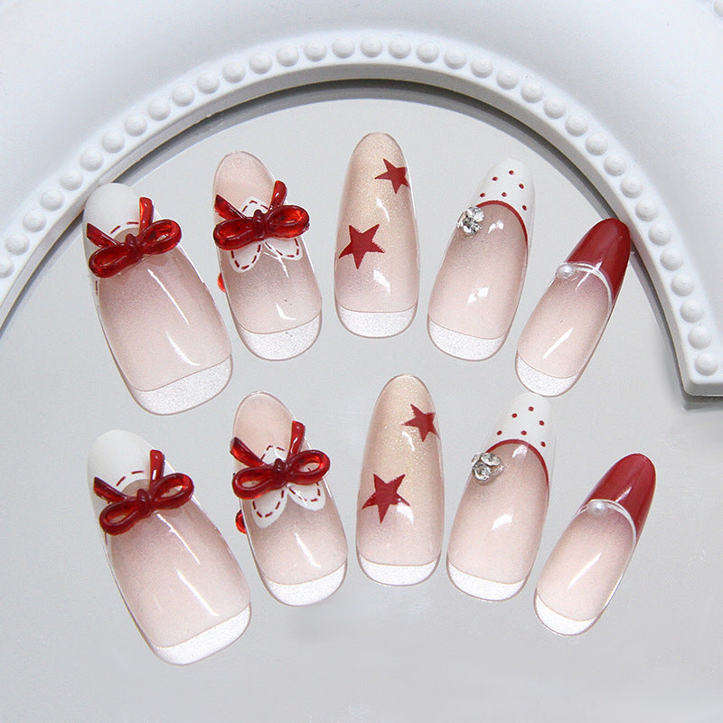 Medium Almond Bowknot & Polka Dot Press-On Nail Set (30 Pieces) on hand