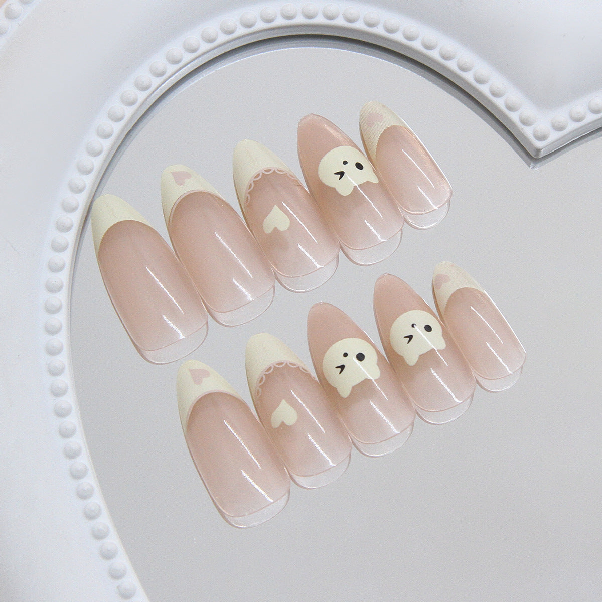 French Tip & Heart Press-On Nails, Medium Almond – side angle