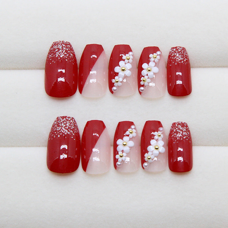 Wine Red & Floral Press-On Nails, Medium Ballerina on hand